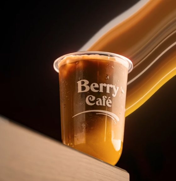 An iced coffee in a Berry Café cup